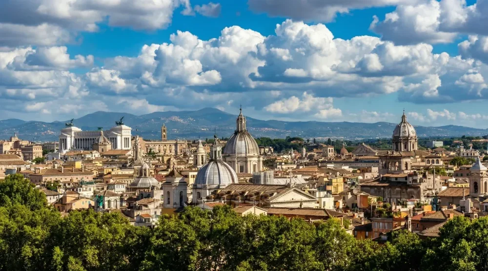 Breathtaking panoramic view of the Rome skyline and St. Peter's Basilica from the Castel Sant'Angelo terrace